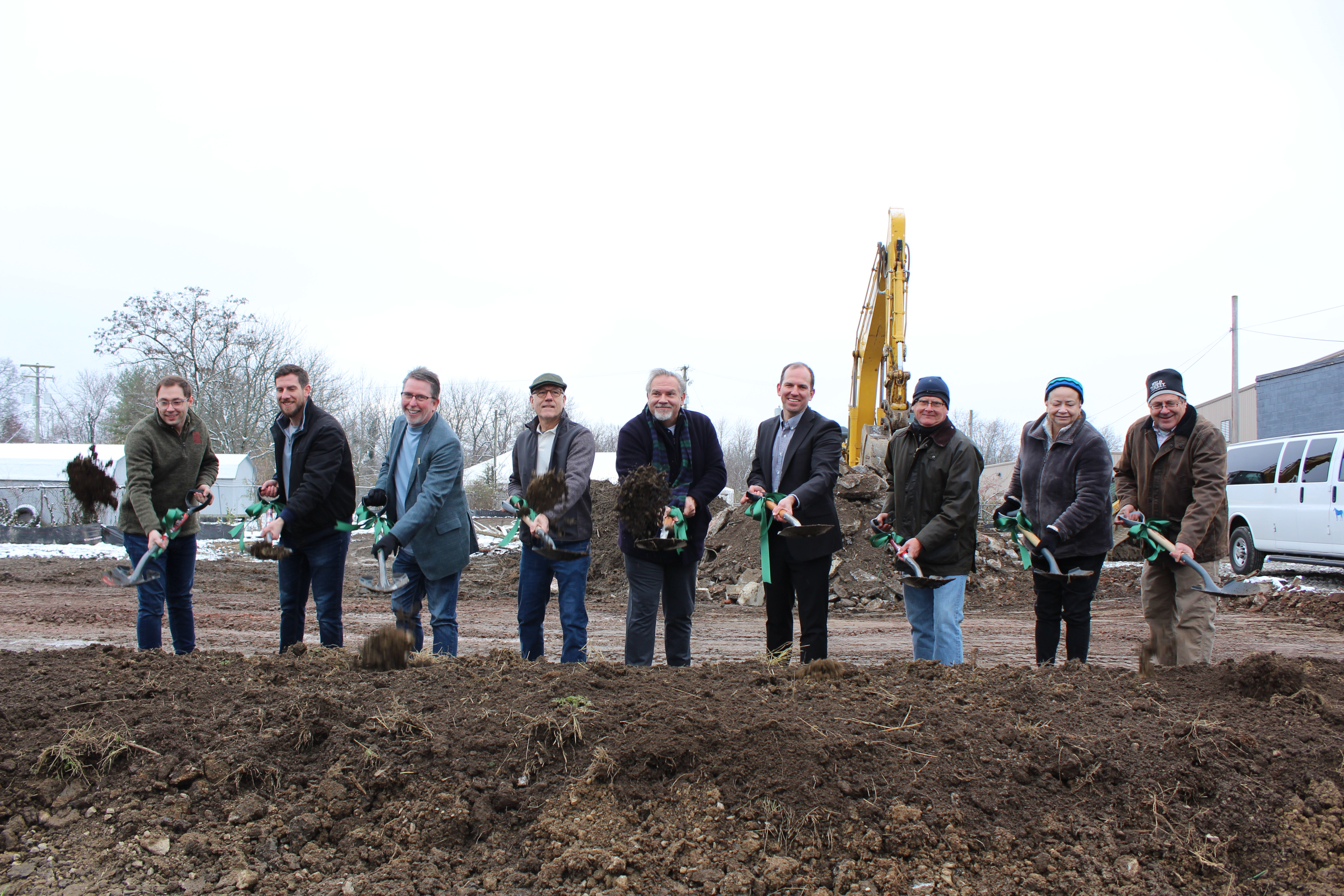 Photo of team at groundbreaking for the rail yard 