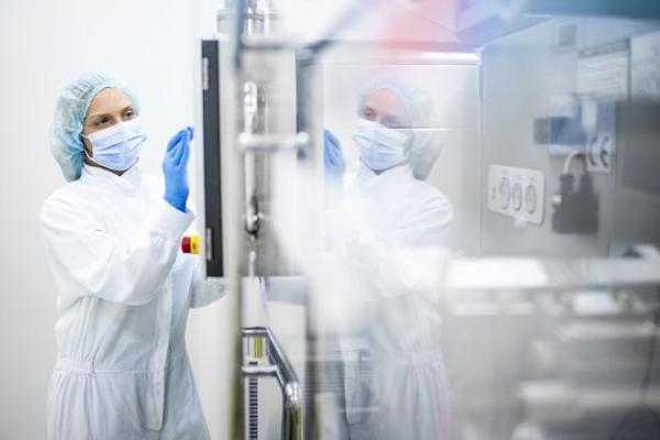 Photo of woman testing medicine 